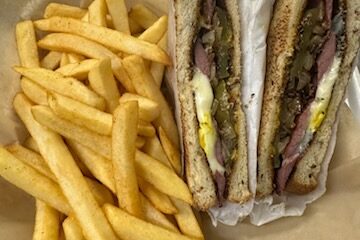 Meet sandwich and fries.